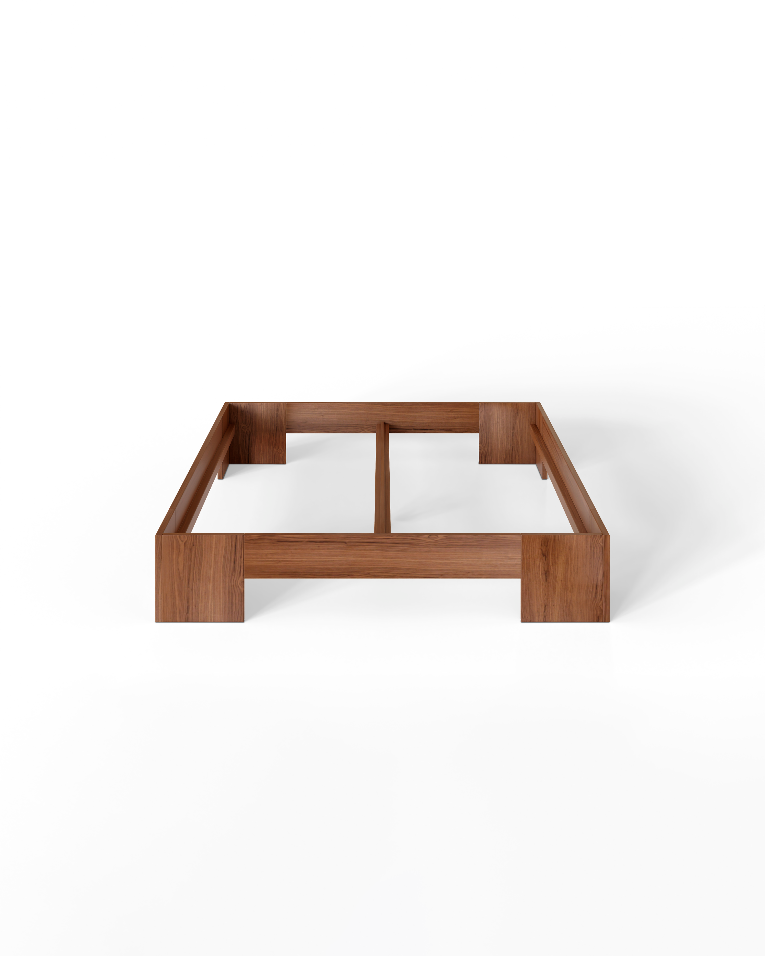 Wooden bed frame on a white background