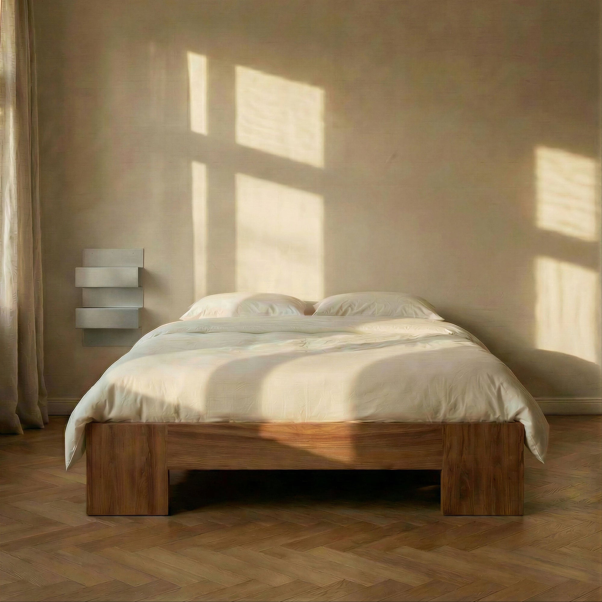 Bedroom with wooden bed and sunlight casting shadows on the wall