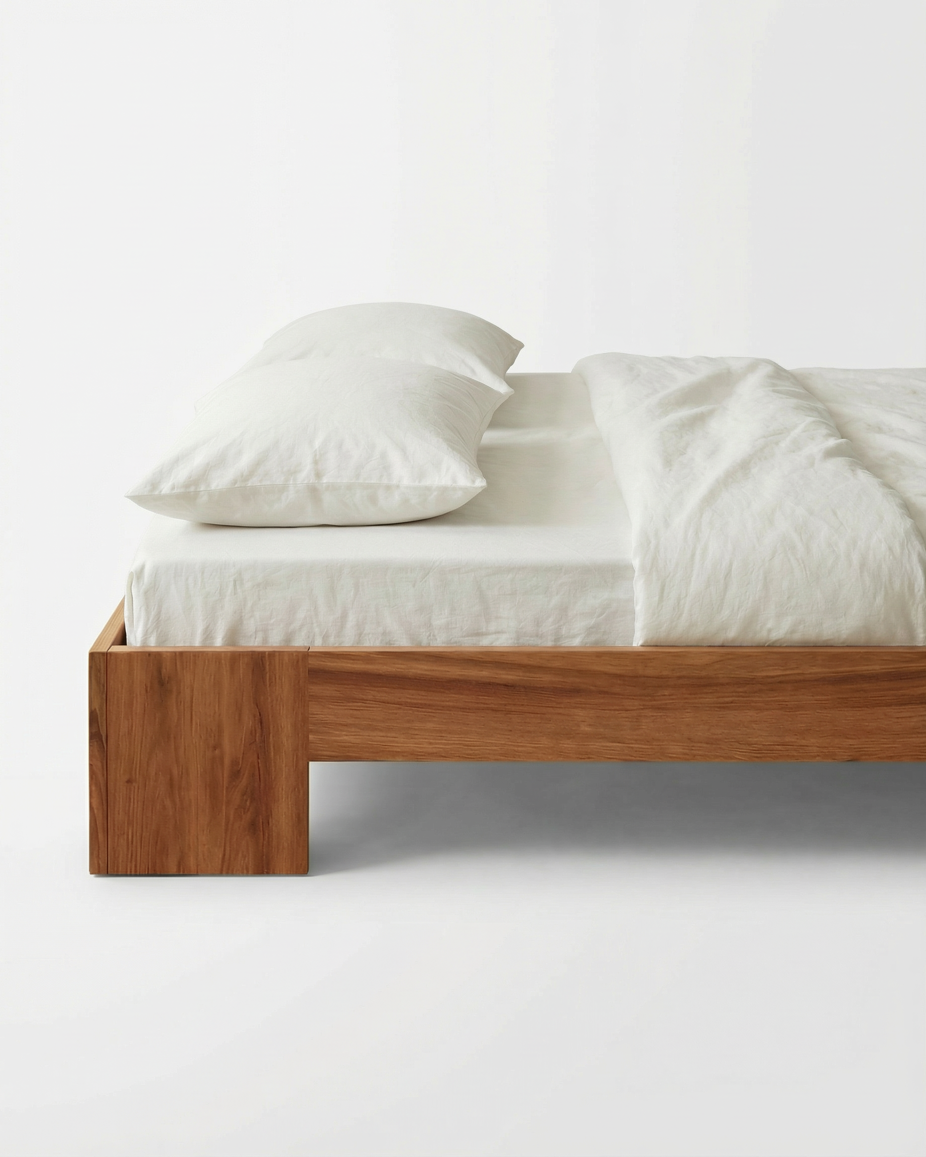 Tunnel Bed Frame in solid Elm wood, front view on white background