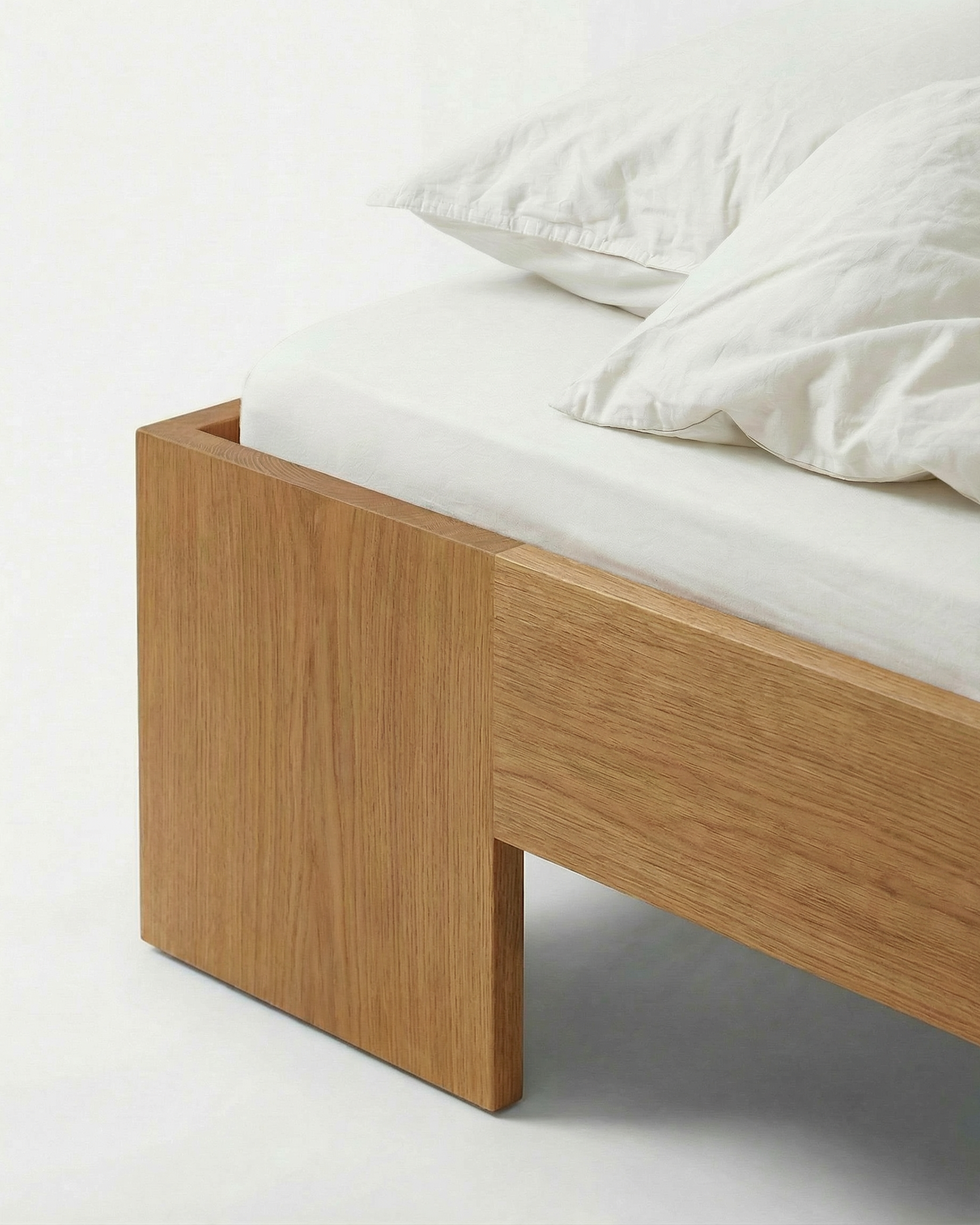 Tunnel Bed Frame in solid Oak wood, front view on white background